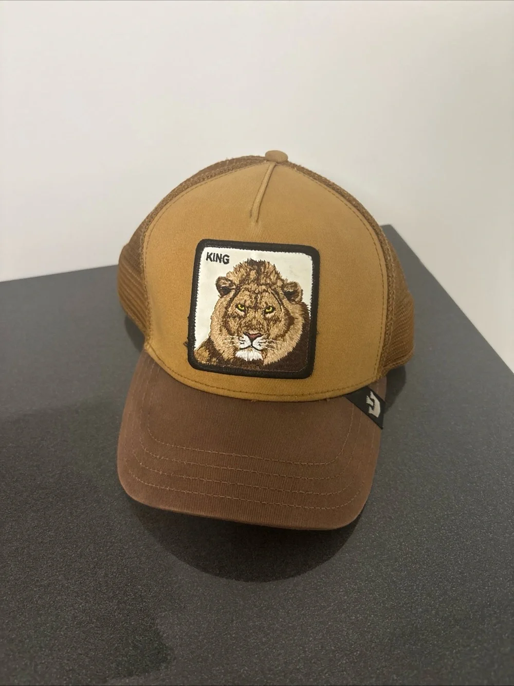 Goorin Bros Two-Tone Lion Patch Trucker Cap in Brown and Tan